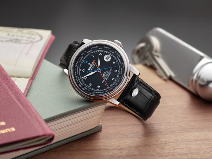 The black model of the "Magallanes" automatic watch lies between your passport, books and room key.